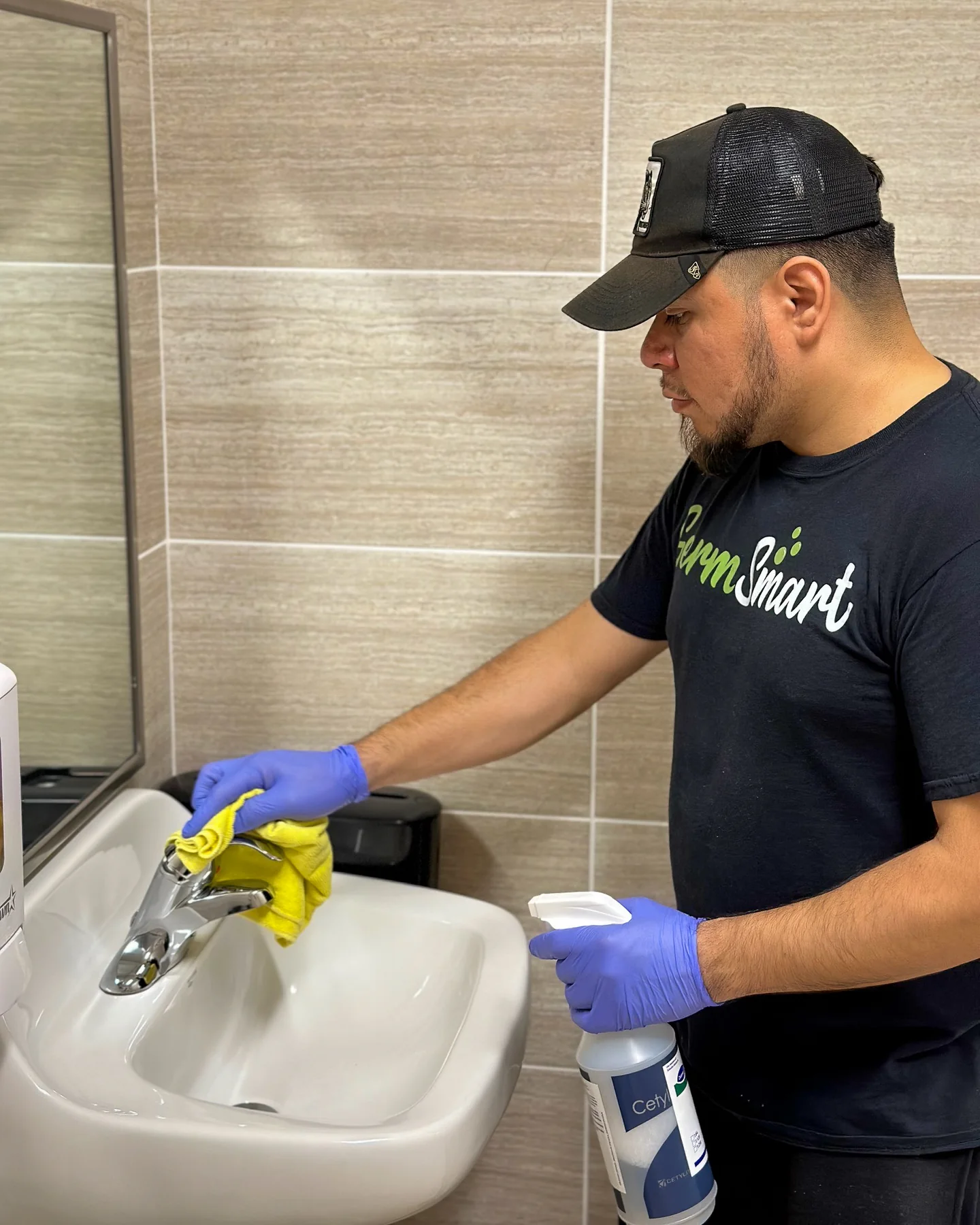 GermSmart cleaner disinfecting a guest restroom sink